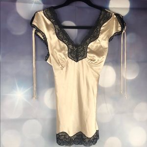 Silky soft camisole style top w/tie back
